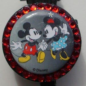 Vintage dancing Mickey and Minnie badge reel