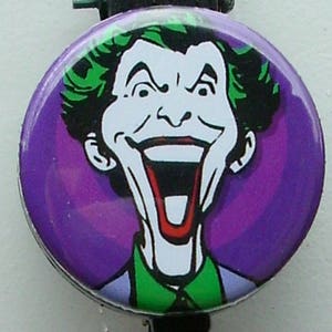 Laughing &quot;The Joker&quot; comic badge reel