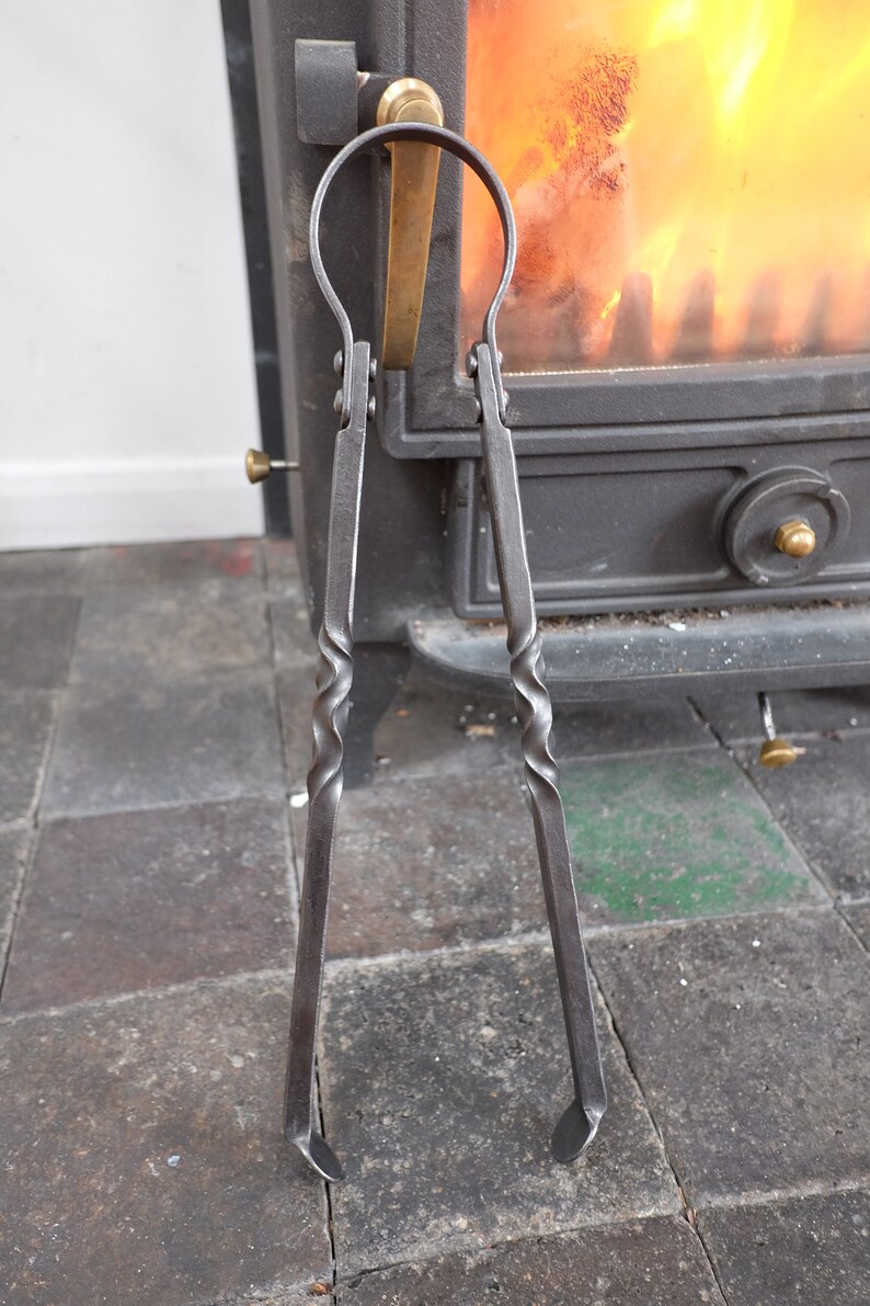 Hand water twist fire tongs Etsy