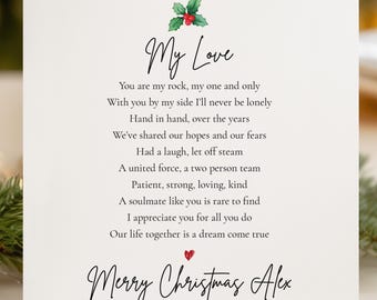 May include: A square white greeting card featuring a watercolor holly sprig at the top and a small red heart above the text. The card displays the poem My Love followed by the message Merry Christmas Alex in black script and serif fonts.