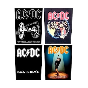 Peut inclure: Quatre patchs thermocollants AC/DC noirs et blancs. Les patchs présentent le logo du groupe et le texte "For Those About To Rock", "Back In Black" et "Let There Be Rock".