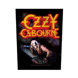 Peut inclure: Patch brodé noir et rouge avec le texte "OZZY OSBOURNE" en jaune. Un personnage ressemblant à un loup-garou avec de longs cheveux et des crocs est représenté en arrière-plan.