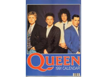 May include: A vintage 1991 Queen calendar featuring a photo of the band members: Brian May, Roger Taylor, Freddie Mercury, and John Deacon. The calendar is blue with the band's name in red letters.
