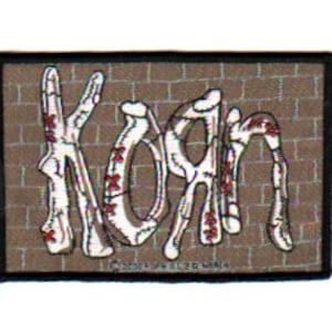 KORN patch:   Brick Wall sew on woven patch.  Officially licensed  Nu metal/ rock band