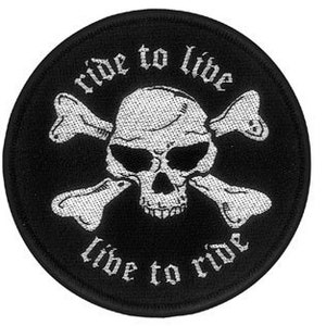 May include: Black and white embroidered patch featuring a skull and crossbones. The text "ride to live live to ride" is stitched around the skull and crossbones.