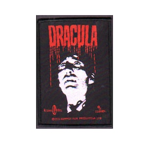 May include: Black and white patch with the word "Dracula" in red dripping blood. The patch features a black and white image of a man's face looking up.