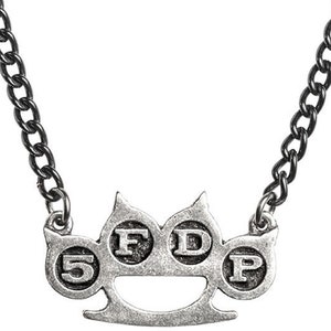 May include: A silver-toned necklace with a brass knuckle pendant featuring the letters "5FDP" in raised lettering.