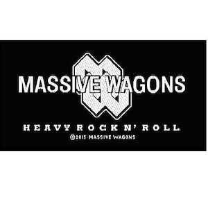 May include: Black and white logo for the band Massive Wagons. The logo features the band's name in a bold, white font with a stylized 'W' in the center. The text 'Heavy Rock'n' Roll' appears below the band's name, with the copyright symbol and the year 2015.