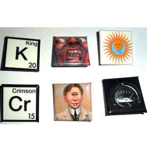 May include: Five square-shaped buttons with different designs. The first button is white with black text that reads "King K 20". The second button is red with a red and white image of a face with an open mouth. The third button is white with a yellow sun and a blue moon image. The fourth button is white with black text that reads "Crimson Cr 15". The fifth button is black with a silver gauge.
