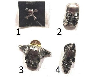 Skull  x 4 different metal pins badges,  skull faces. You choose design.