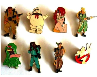 GHOSTBUSTERS pins:  original enamel badges/ pins,  from 1984 - 1989.  Set of 8.   Licensed by Columbia Pictures Inc.