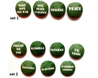 Peace / combat badges . You choose designs:  set 1  x  4 badges peace love,  set 2 x 7 combat badges.  All new, button 1 inch badges
