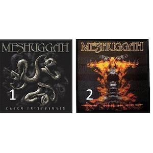 May include: Two black embroidered patches with the band name "Meshuggah" in gold lettering. The first patch features a silver snake design and the text "Catch Thirtythree". The second patch features a fiery orange and yellow design with the text "Nothing".