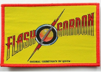 QUEEN :  FLASH GORDON  woven sew on patch -  official - no longer made.  Film soundtrack by Queen. Special Red border