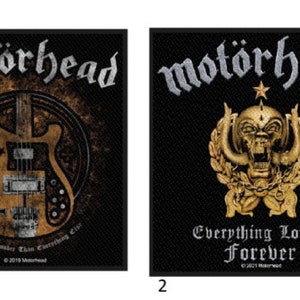 Peut inclure: Deux écussons noirs Motörhead. L'un présente une guitare avec le texte "Everything Louder Than Everything Else". L'autre affiche un crâne avec le texte "Everything Louder Forever."
