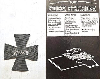 VENOM patch: 'CROSS' sew on woven iron on  patch , still in original package. Made in England