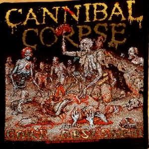 Cannibal Corpse patch: 'Gore Obsessed'  vintage woven patch.  Officially licensed 2002  , Death Metal band.