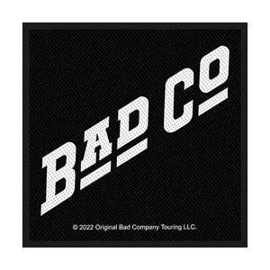 May include: Black square patch with the white text "BAD CO" in a bold, angled font. The text has a dotted texture. The bottom of the patch includes the text "© 2022 Original Bad Company Touring LLC."