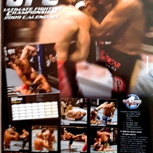 UFC calendar 2009 UFC WRESTLING calendar. Ultimate Fighting Championship calendar. Shrinkwrapped , in brand new condition. The Rock image 2