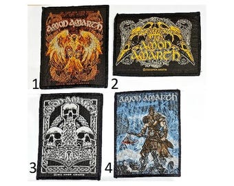AMON AMARTH patch : You choose design, Great sew on patch.  Choice of 4 designs    1. Phoenix  2. Raven skulls   3.  3 skulls  4. Jomsviking