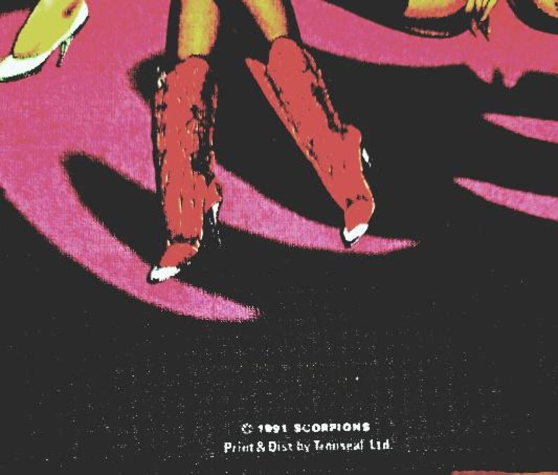 May include: A vintage graphic featuring red high-heeled boots with white tips, set against a pink and black background. The image includes text at the bottom: "&copy; 1991 SCORPIONS Print & Dist by Tenuseal Ltd."