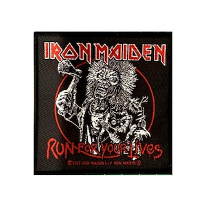 May include: Black square patch with the red text "IRON MAIDEN" above a detailed black and white illustration of a zombie figure holding a hammer. The words "RUN FOR YOUR LIVES" are below the illustration, in red.