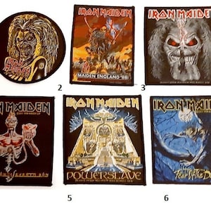 May include: Six Iron Maiden band patches, each featuring a different album cover art. The patches are black with colourful images and text. The album titles are "Iron Maiden", "Maiden England '88", "Seventh Son of a Seventh Son", "Powerslave", "Fear of the Dark", and "Somewhere in Time".