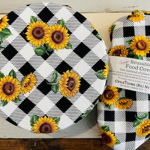 Reusable bowl covers in "Sunflower Checkered" print, featuring a black and white checkered pattern overlayed with vibrant yellow sunflowers and green leaves.
