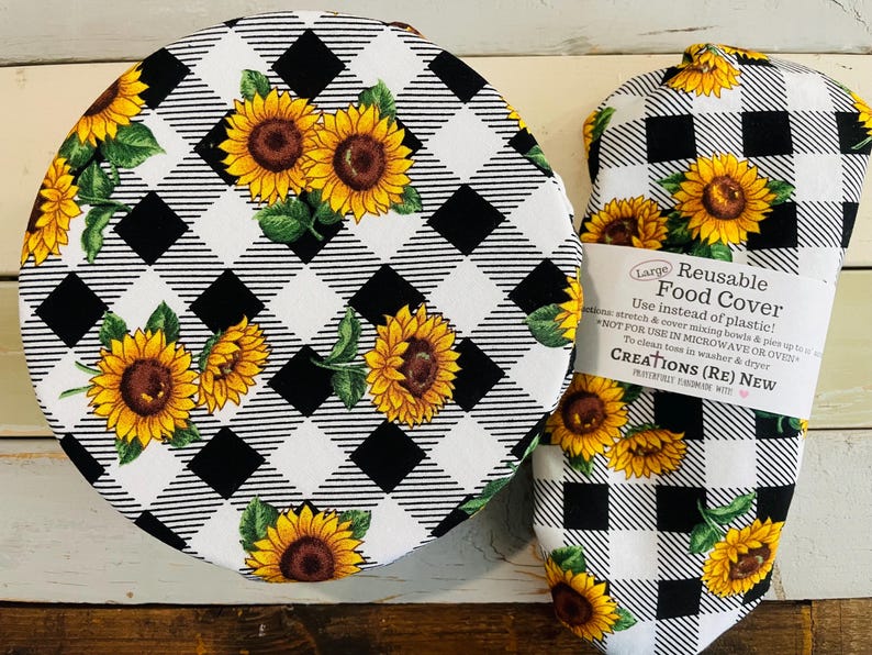 Reusable bowl covers in "Sunflower Checkered" print, featuring a black and white checkered pattern overlayed with vibrant yellow sunflowers and green leaves.