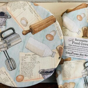 Reusable bowl covers in "Vintage Kitchen" print, featuring illustrations of a rolling pin, eggs, a mixer, and recipe cards on a light blue background.
