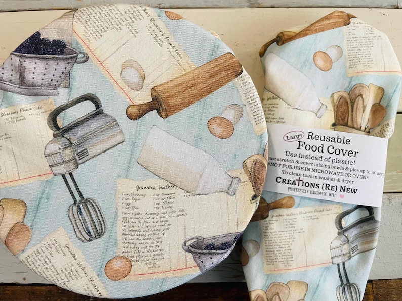 Reusable bowl covers in "Vintage Kitchen" print, featuring illustrations of a rolling pin, eggs, a mixer, and recipe cards on a light blue background.