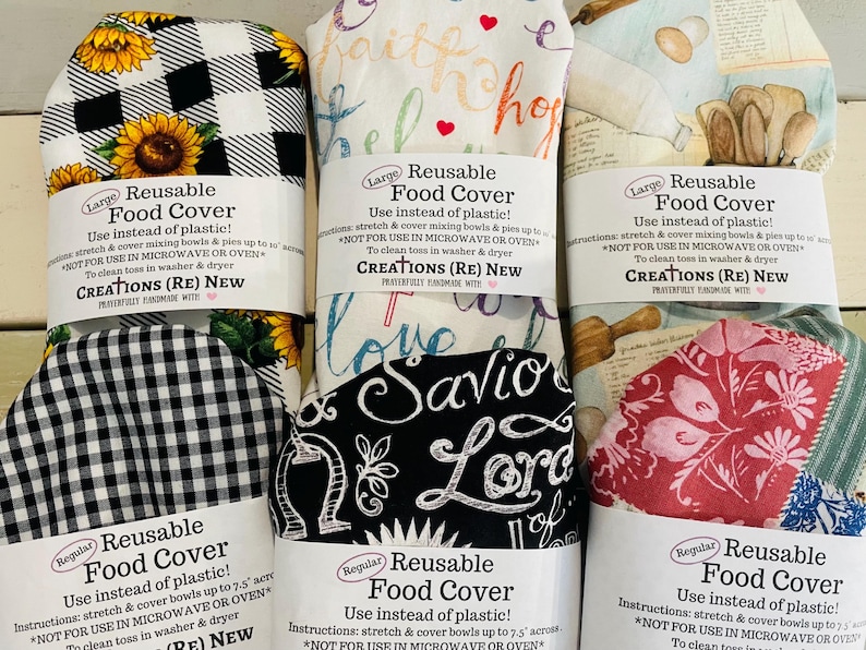 A collection of reusable food covers with various patterns, including sunflowers, gingham, and floral designs. These food covers are designed to stretch and cover a variety of sizes of food dishes, & are machine washable & dryable.