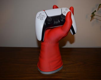 Omni man inspired controller stand.