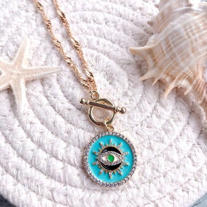 Reef break evil eye necklace top
