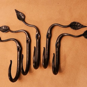Hand forged leaf hooks. Sold "each"  Made to order.