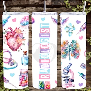May include: A set of three white tumblers with a colourful design featuring medical imagery, including a heart, lungs, brain, stethoscope, pills, and a syringe. The middle tumbler has the word "RADIOLOGIST" written in pink, blue, and purple letters.