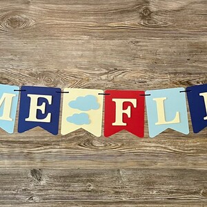 TIME FLIES banner option. Made on one ribbon with airplanes on the end flags and a cloud flag between words.