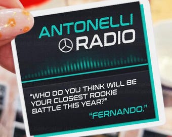 May include: A square sticker with the words "ANTONELLI RADIO" in teal and white. Below the text is a graphic of sound waves. The sticker also includes the quote, "WHO DO YOU THINK WILL BE YOUR CLOSEST ROOKIE BATTLE THIS YEAR?" and the name "FERNANDO."