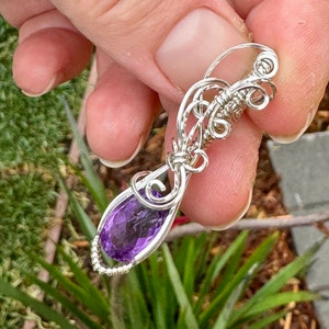 Faceted Amethyst in sterling  silver wire wrapped pendant