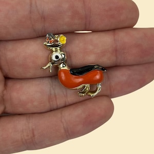 1940s enamel gold-toned duck pin, vintage orange & black duck brooch w/ flowers