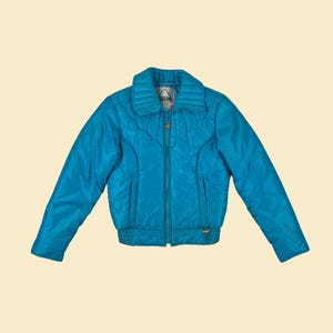 1980s women&#39;s ski jacket by Snuggler, vintage size 8 teal blue zip up puffer jacket