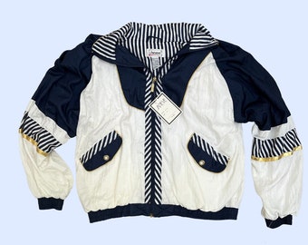 80s Janeve patterned windbreaker with tags, 80s Janeve blue and white medium women's jacket, patterned pufffy zip up with shoulder pads