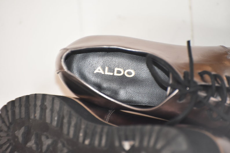 6.5-7 US Aldo Silver Chunky Compensated Shoes Like new Black laces 6.5-7US