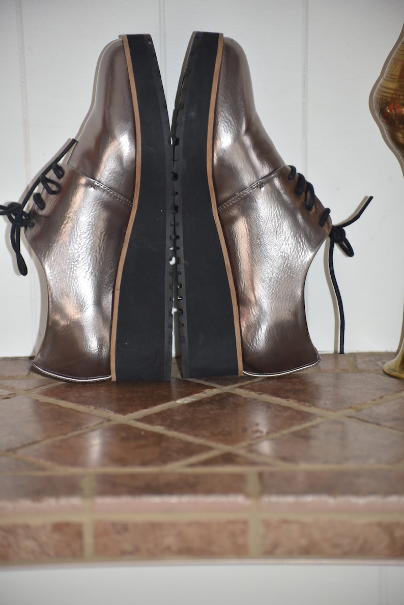 6.5-7 US Aldo Silver Chunky Compensated Shoes Like new Black laces 6.5-7US