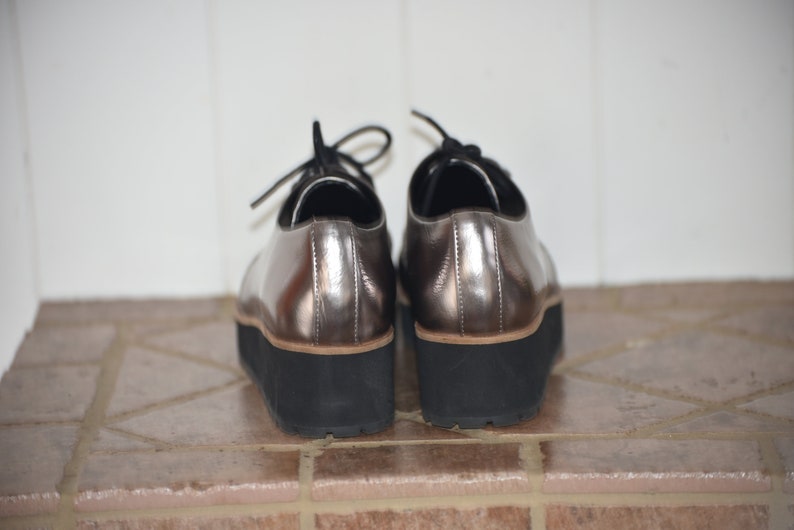 6.5-7 US Aldo Silver Chunky Compensated Shoes Like new Black laces 6.5-7US