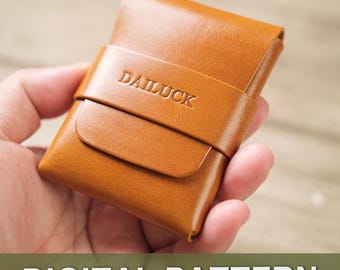 May include: A tan leather wallet with the word "DAILUCK" embossed on the front. The wallet is secured with a matching leather strap. The words "DIGITAL PATTERN" are displayed in white text at the bottom of the image.