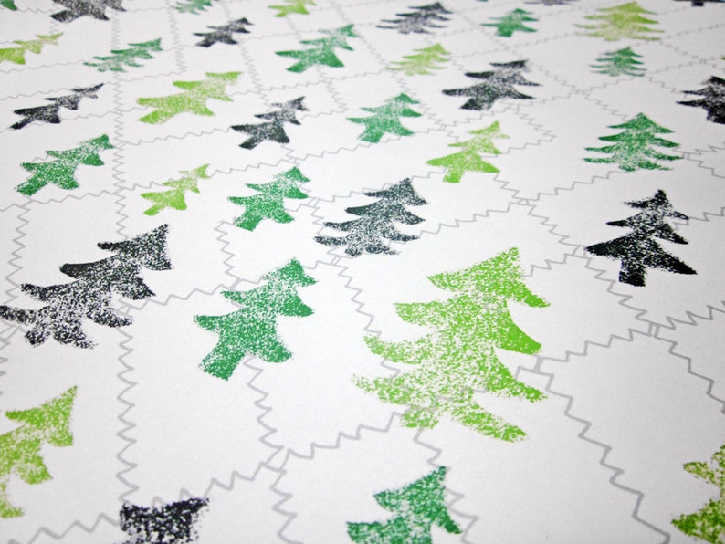 May include: White background with a repeating pattern of green and black stylized pine trees. The trees are printed in a textured style.