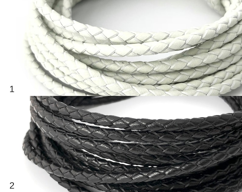 Puede incluir: Dos carretes de cord&oacute;n de cuero trenzado. El carrete superior es blanco y el carrete inferior es negro.