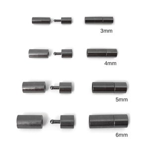 May include: Four sets of black magnetic clasps for jewelry making, shown in sizes 3mm, 4mm, 5mm, and 6mm.