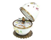 music box, decorative musical egg with bee. waltz flowers music. hand crafted Limoges France.